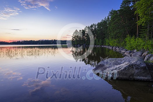Peaceful lake scenery in july
