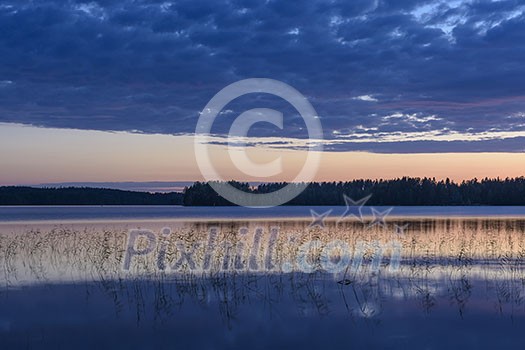 Colorful lake scenery in summer night Colorful lake scenery in summer night
