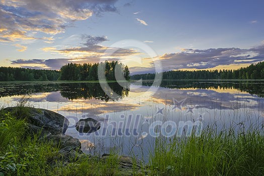 Summer night atmosphere by the lake