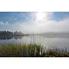 Foggy lake scenery in september