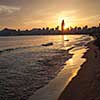 Golden sunset in the Poniente beach in Benidorm, Spain