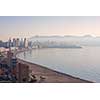 Aerial View from mountain of the city of Benidorm, Spain taken in the early morning when the city is covered with fog