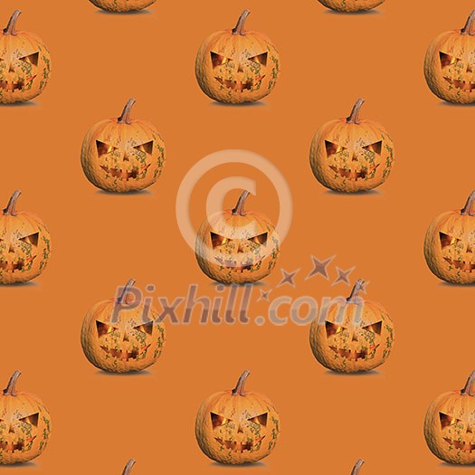 pattern of halloween pumpkins on an orange background