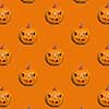 pattern of halloween pumpkins on an orange background