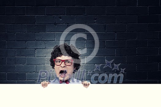 Young funny man in glasses with big head Young funny man in glasses with big head