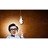 Young funny man in glasses with big head