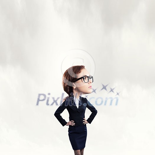 Funny young businesswoman with big head wearing glasses