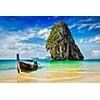 Tropical vacation holiday tourism beach concept - Long tail boat on tropical beach, Krabi, Thailand