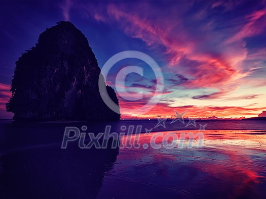 Vintage retro effect filtered hipster style image of tropical vacation holidays sunset resort beach. Pranang beach. Railay , Krabi Province Thailand Vintage retro effect filtered hipster style image of tropical vacation holidays sunset resort beach. Pranang beach. Railay , Krabi Province Thailand