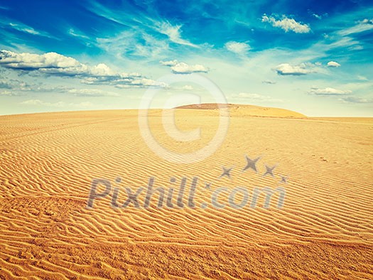 Vintage retro effect filtered hipster style image of white sand dunes on sunrise, Mui Ne, Vietnam