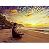 Vintage retro effect hipster style image of sporty fit man doing yoga meditating in padmasana lotus pose on tropical beach on sunset