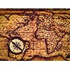 Travel geography navigation concept background - vintage retro effect filtered hipster style image of old vintage retro compass on ancient world map