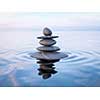 3d rendering of Zen stones in water with reflection - peace balance meditation relaxation concept