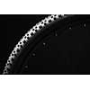 Modern MTB race mountain bike tyre isolated on black background in a studio