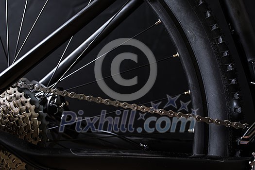 Modern MTB race mountain bike isolated on black background in a studio Modern MTB race mountain bike isolated on black background in a studio