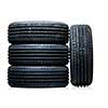 Stack of brand new high performance car tires on clean high-key white studio background