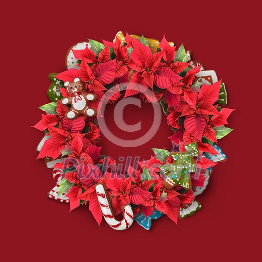 Christmas twig wreath is decorated with candy, red flowers, cookies and green leaves.