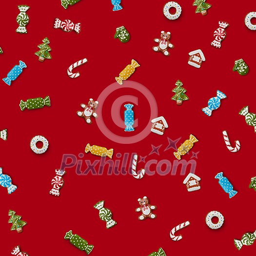 Christmas gingerbread cookies of different shapes on a red background.