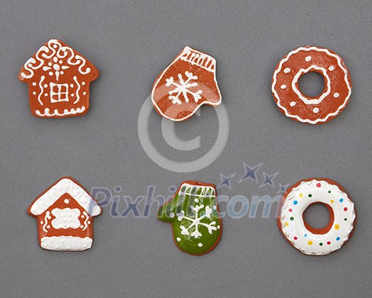 Christmas gingerbread cookies on a gray background