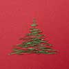 Christmas tree pine needles on a red background. Christmas concept.