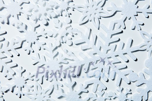 Snowflakes on a white background. Winter Christmas Background