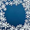 Christmas frame background with snowflakes. Isolated on a blue background with copy space