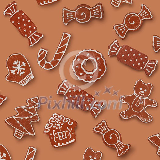 brown background with homemade various shaped christmas gingerbread cookies