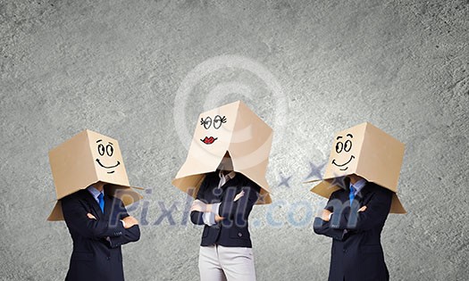 Unrecognizable business people with carton boxes on head