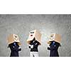 Unrecognizable business people with carton boxes on head