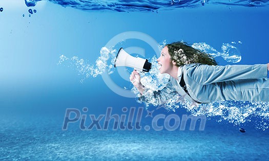 Young businesswoman in suit swimming in crystal blue water Young businesswoman in suit swimming in crystal blue water