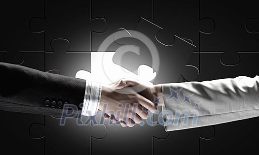 Close up of businessman hands making deal