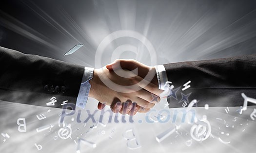 Close up of businessman hands making deal