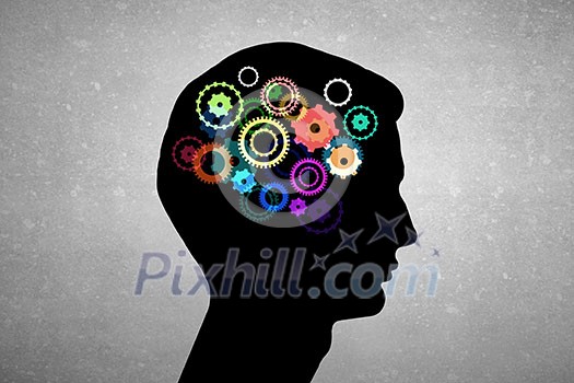 Silhouette of human head with gears instead of brain Silhouette of human head with gears instead of brain