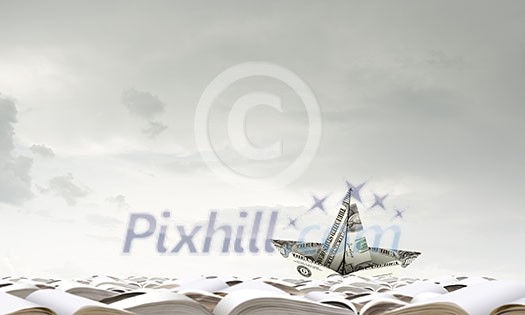 Paper ship floating on water on waves Paper ship floating on water on waves
