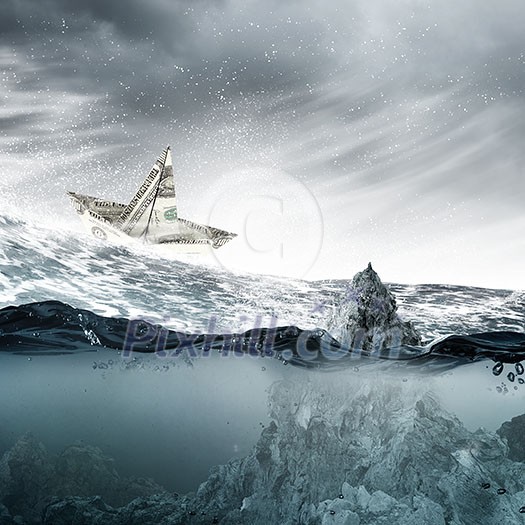 Paper ship floating on water on stormy waves Paper ship floating on water on stormy waves