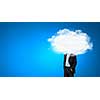 Businessman standing with his head in cloud