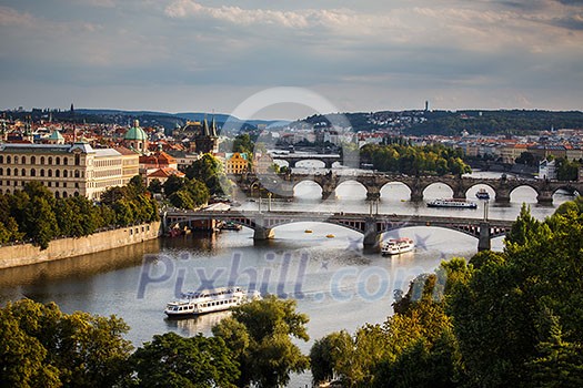 Prague with its splendid bridges over the Vltava river, city sunset panorama, Czech Republic