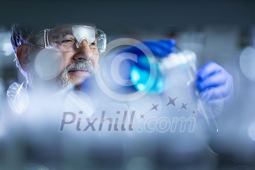 Senior male researcher carrying out scientific research in a lab (shallow DOF; color toned image)