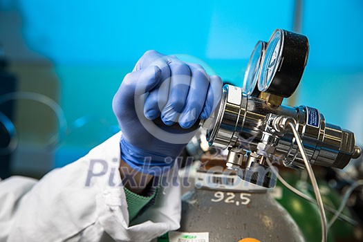 Hands of a researcher carrying out scientific research in a lab Hands of a researcher carrying out scientific research in a lab