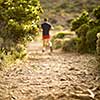 Young man running outdoors on a lovely sunny day