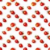 flat lay of beautiful trendy seamless pattern cherry tomato isolated on white