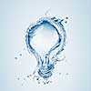 Light bulb from water splash isolated on a blue background