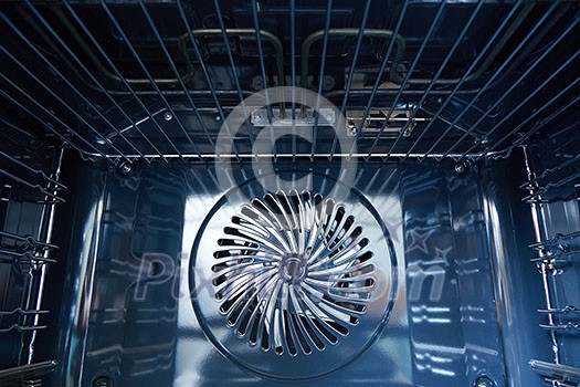 Detail of the interior of a modern oven built with fan Detail of the interior of a modern oven built with fan