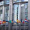 Fragment of European Parliament Buildings, European symbols and flags. Brussels, Belgium.