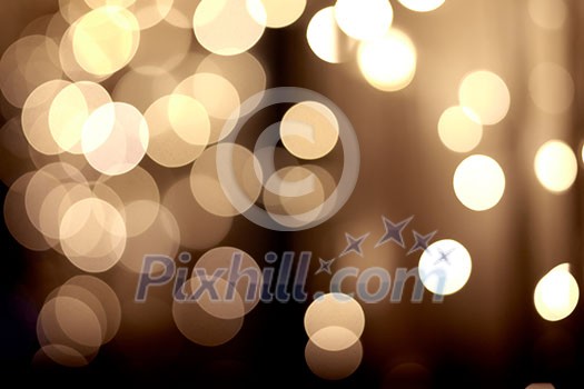Holiday background. Festive abstract background with bokeh defocused lights