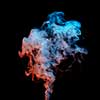 colored smoke stream isolated on a black background,