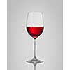 red wine in a glass isolated on a gray background