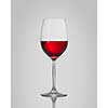 red wine in a glass isolated on a gray background