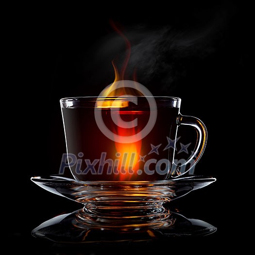 glass cup with tea and saucer isolated on black background close-up