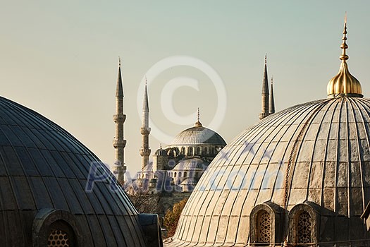 view from above of the domes of the Suleymaniy mosque against the sky in Istanbul, Turkey